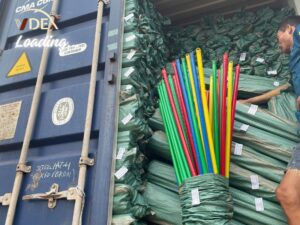 Loading-container-wooden-broom-handles