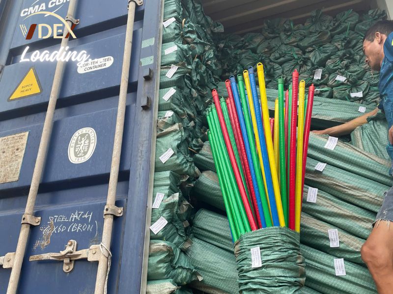 Loading-container-wooden-broom-handles